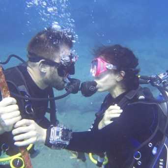 a person holding a glass of water