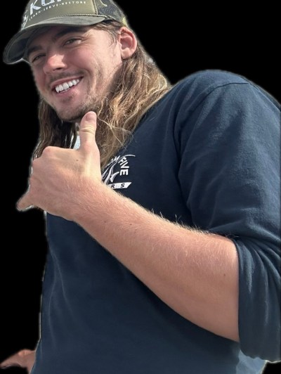 Screenshot a man wearing a hat